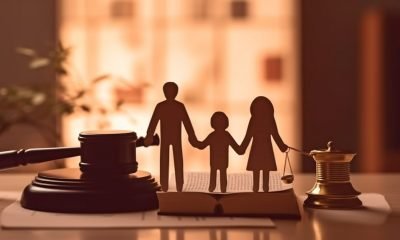 Family, book, and judge's gavel made of paper. Generative AI, family law